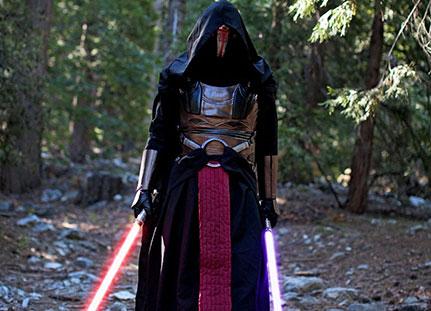 Darth Revan cosplay dual wielding lightsabers